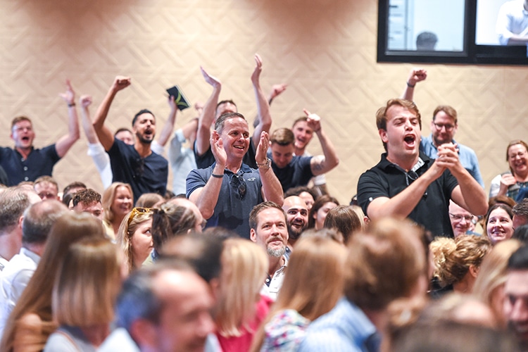 Emagineers showing joy, cheering and clapping