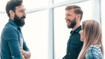 A consultant meeting two managers at a job interview.