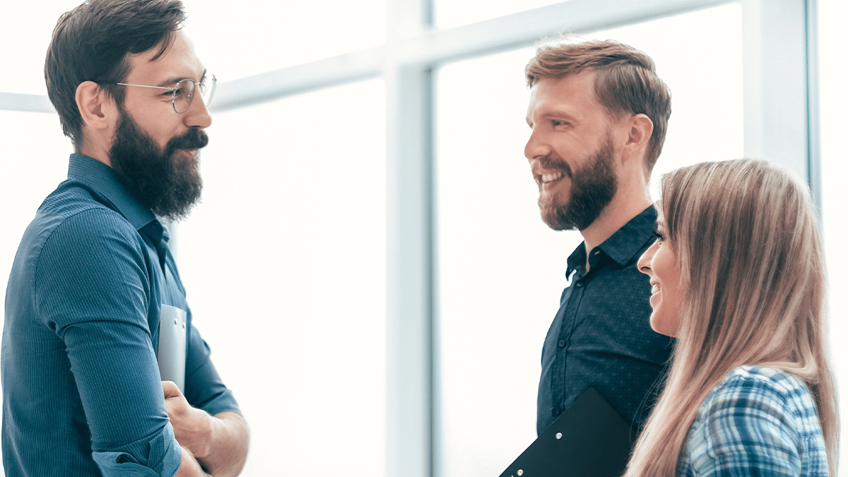 A consultant meeting two managers at a job interview.