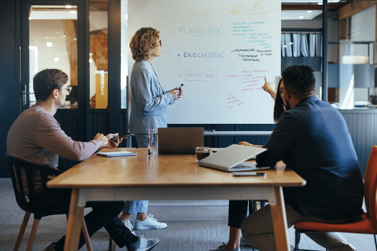 A business consultant giving a presentation at work.