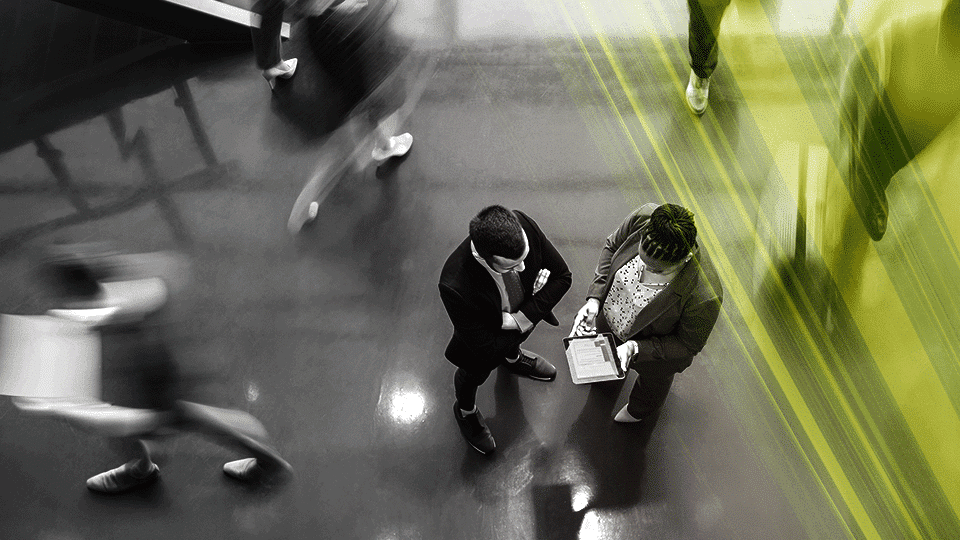 Consultants and advisors i an office space seen from above