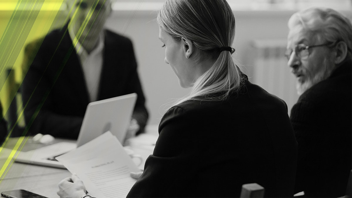 Senior security consultants around a table